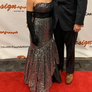 Black and silver sequined mermaid gown.